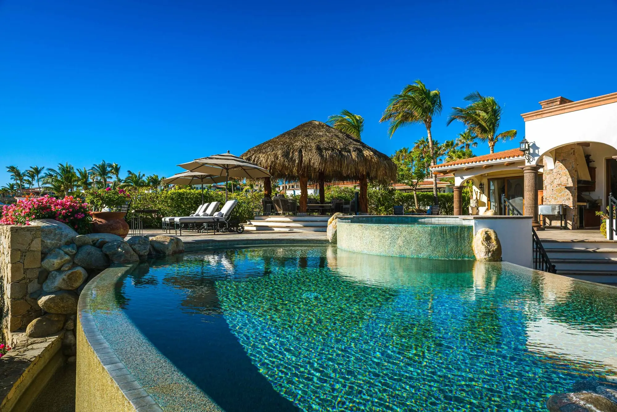 Palmilla Luxury Homes for Sale 2026 featuring an oceanfront estate with infinity pool overlooking the Sea of Cortez in Los Cabos