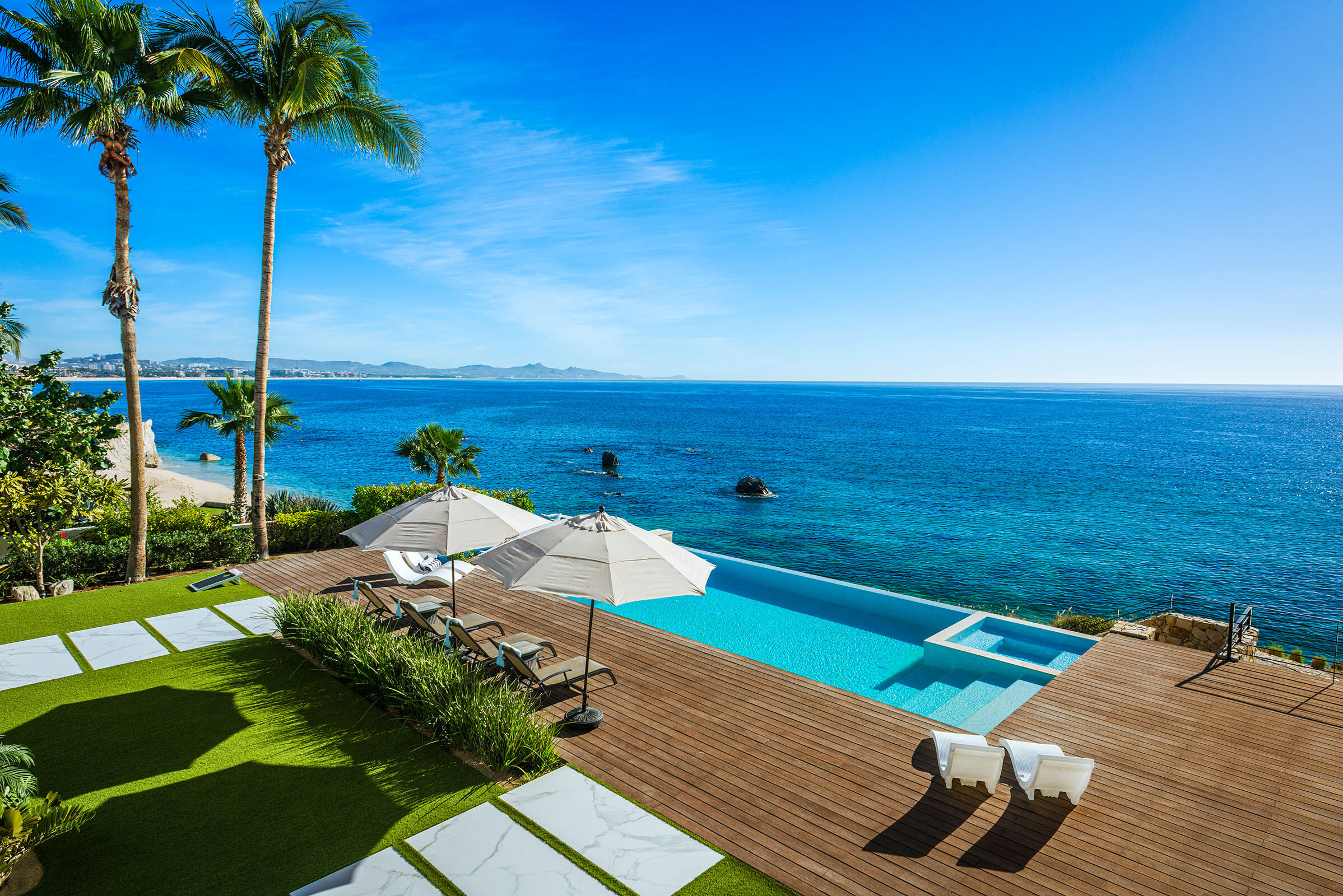 Palmilla La Caleta Casa Hendo is a stunning oceanfront estate perched above a swimmable cove, offering breathtaking Sea of Cortez for sale